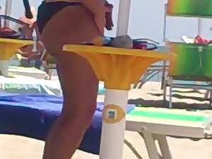 Spying Filthy bitch with big plumper dirty ass at beach